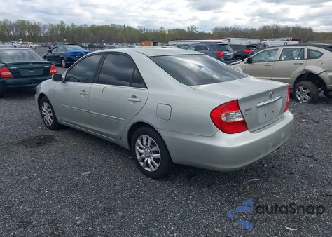 2002 Toyota Camry Xle z USA, uszkodzony, nr VIN 4T1BE32K42U625244